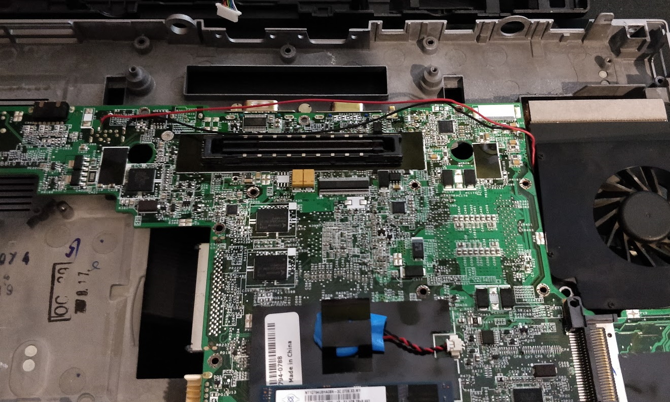 Testing the repair before fitting back into the case.