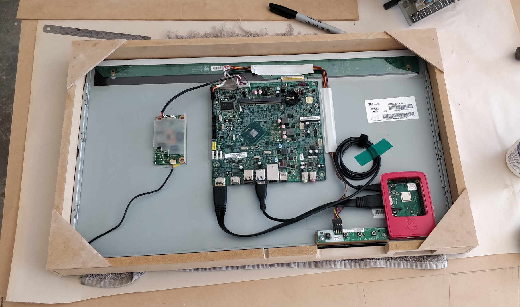 Building a shroud around the display to house the electronics.